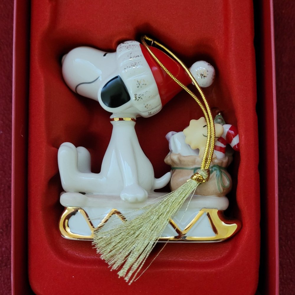 SNOOPY SLEDDING INTO THE HOLIDAYS, with Woodstock of course. BRAND NEW IN BOX